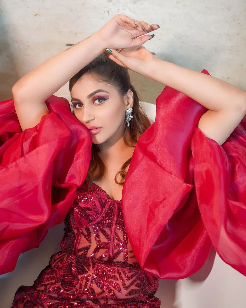 Actress yashika anandh hot photos in red dress with drinks in hand