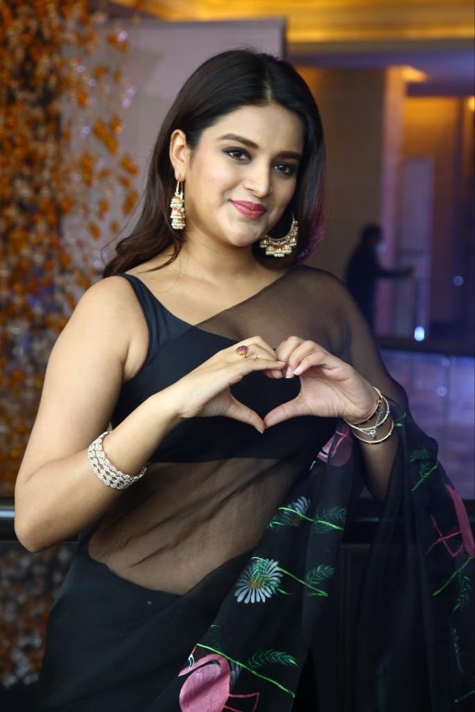 Actress nidhi agarwal hot photos in transparent saree and half blouse