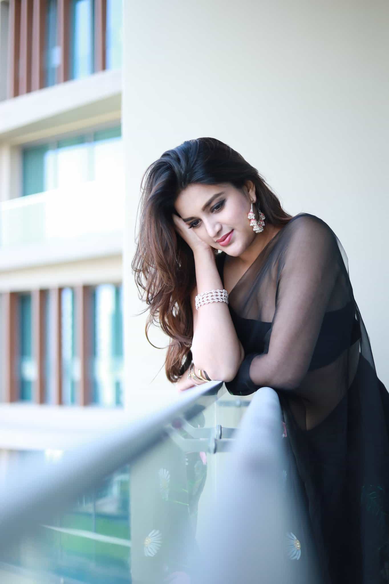 Actress nidhi agarwal hot photos in transparent saree and half blouse