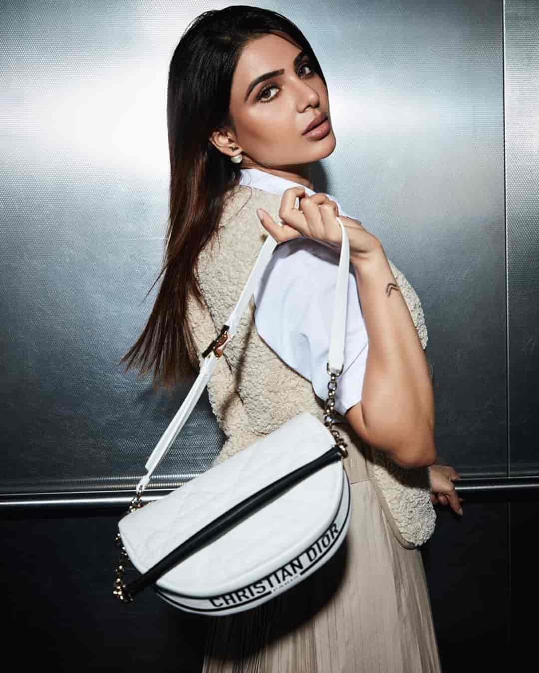 Actress samantha hot photos with hand bag stills