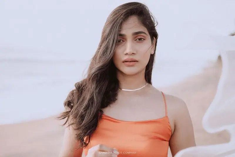 Bigg boss losliya hot latest photos in orange dress