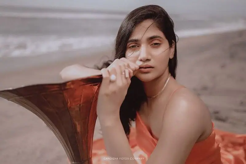 Bigg boss losliya hot latest photos in orange dress