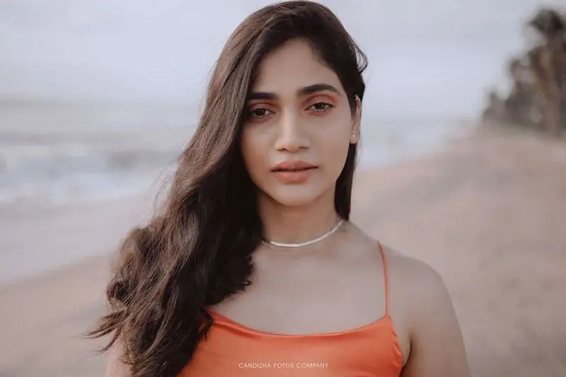 Bigg boss losliya hot latest photos in orange dress