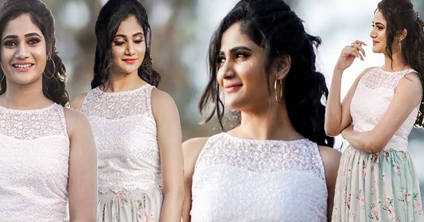 Bigg boss losliya hot latest photos in orange dress