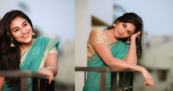 Actress indhuja ravichandran hot photos sitting on bike