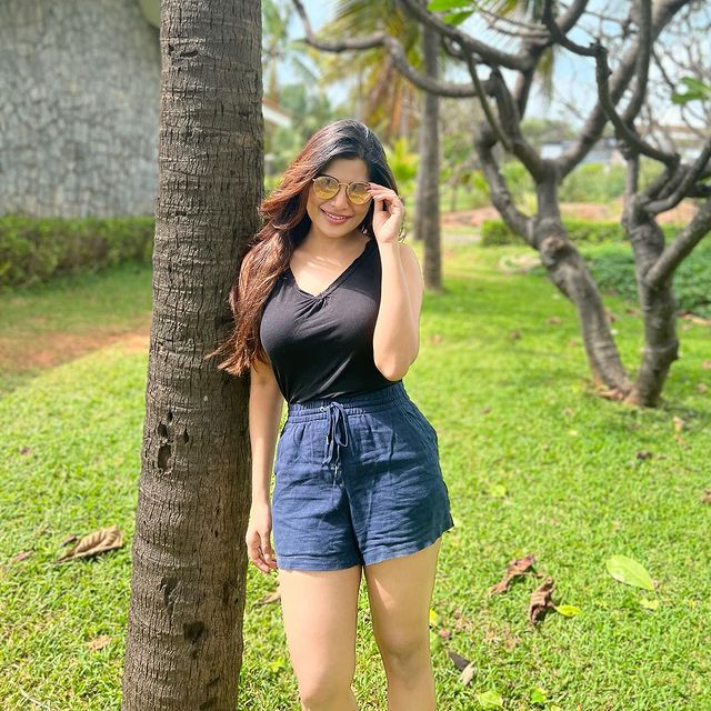 Actress aathmika hot photos in short trouser and tight tops