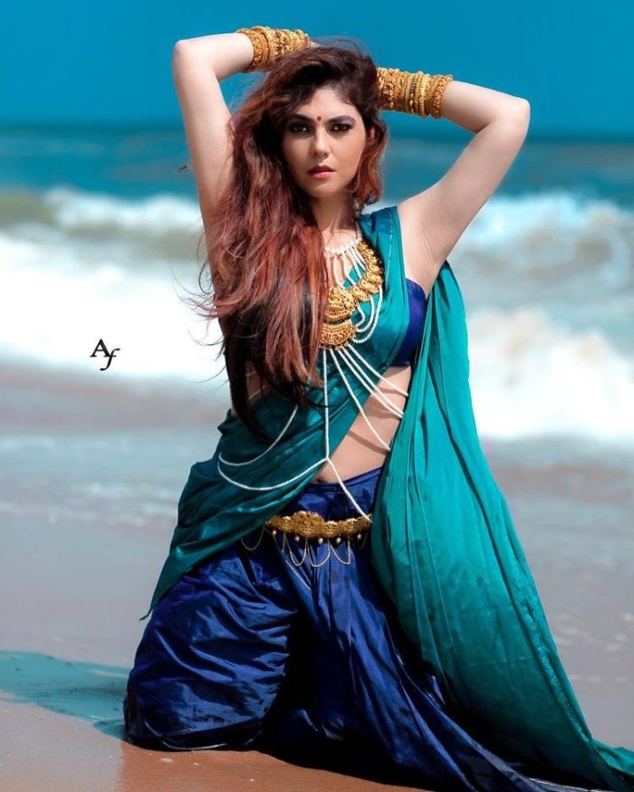 Actress sherin shringar hot photos in pink half saree on celebration