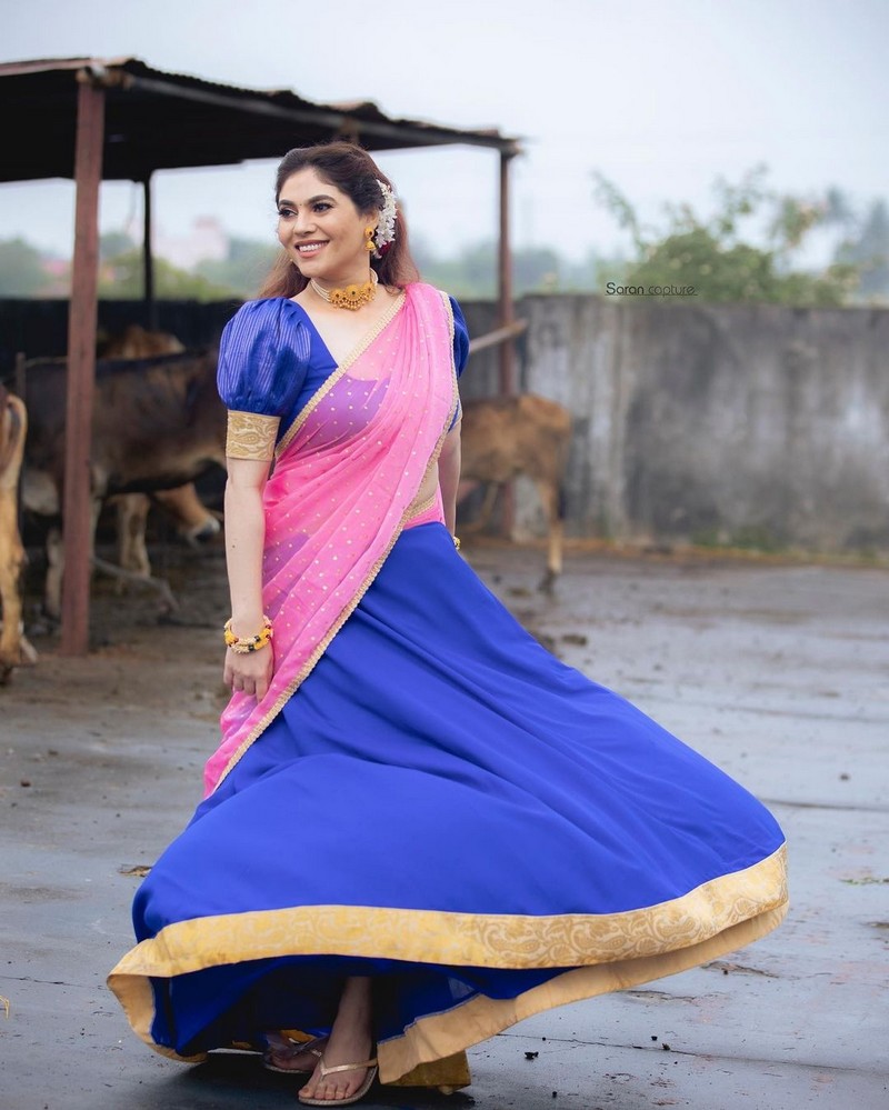 Actress sherin shringar hot photos in pink half saree on celebration