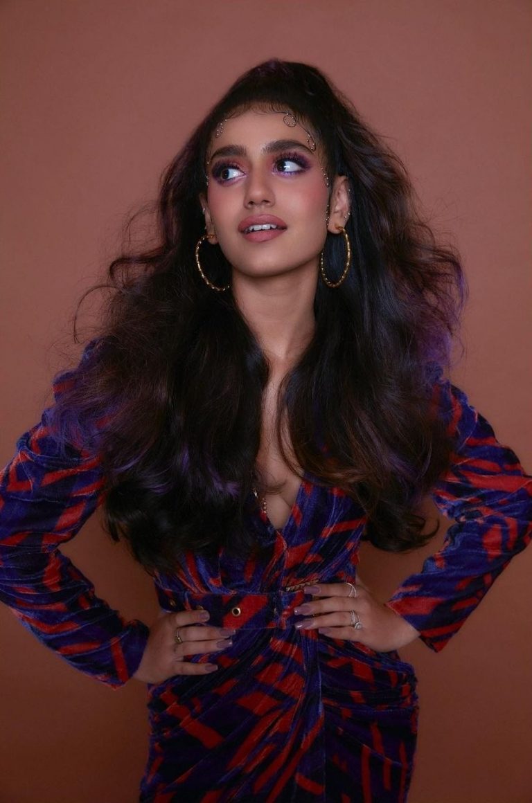 Actress priya varrier hot photos in multicolor modern dress