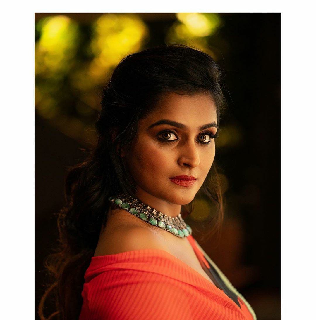 Actress ramya nambeesan hot photos in orange colour dress goes viral