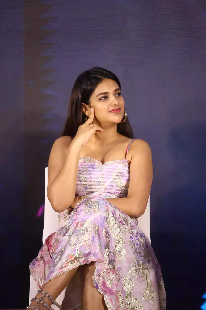 Actress nidhi agarwal hot photos in sleeveless dress on social media