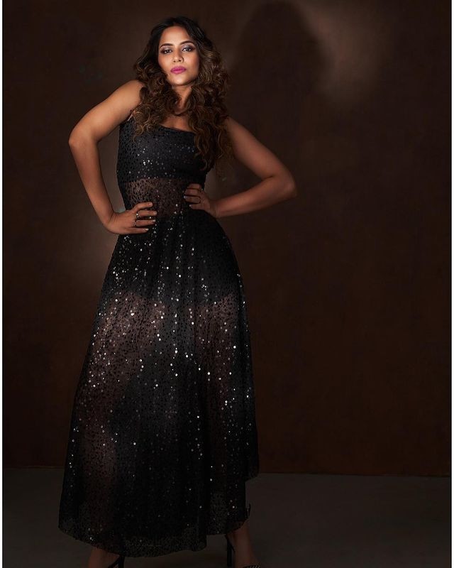 Actress aiswarya dutta hot and glamour photoshoot in black shining dress