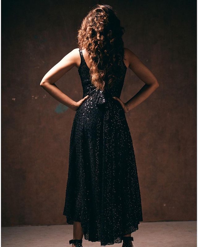 Actress aiswarya dutta hot and glamour photoshoot in black shining dress