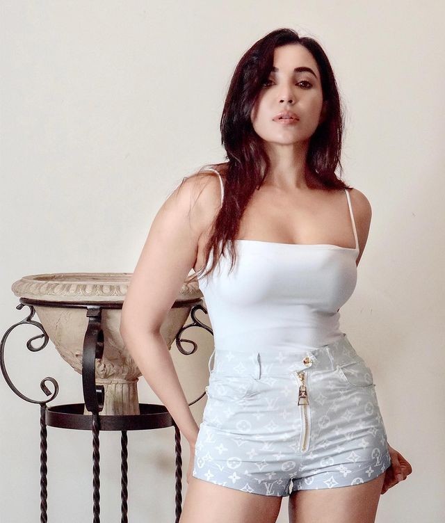 Actress parvati nair hot photoshoot in white slip