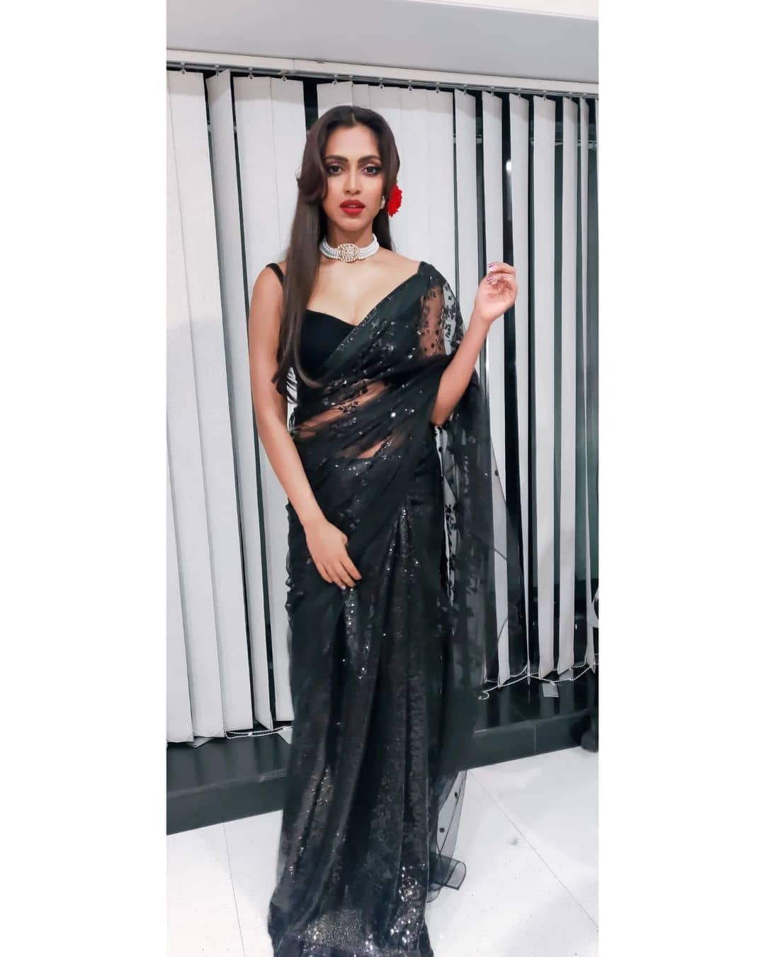 Actress amala paul in hot black saree showing glamour