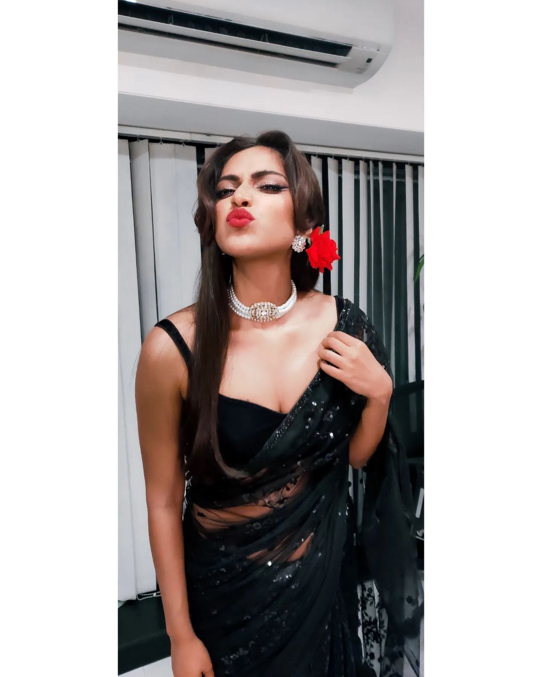 Actress amala paul in hot black saree showing glamour