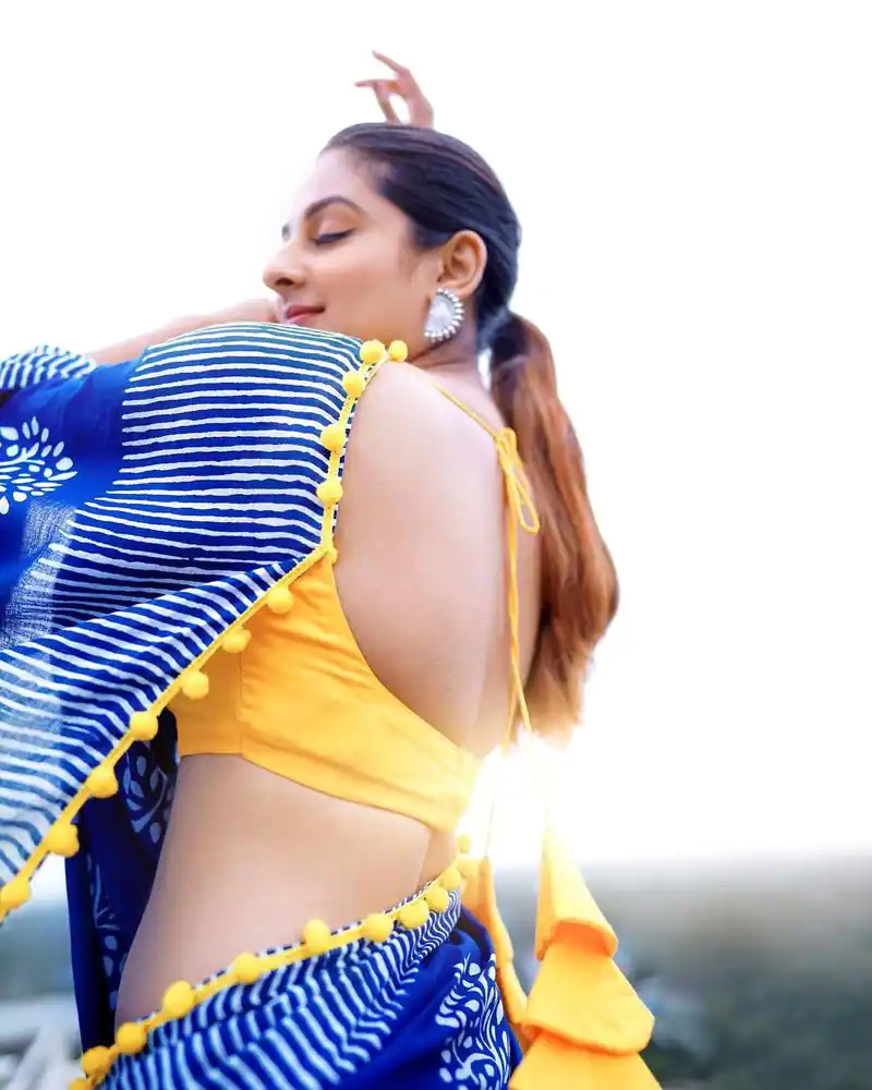 Actress esther anil hot photos in glamourous saree on social media