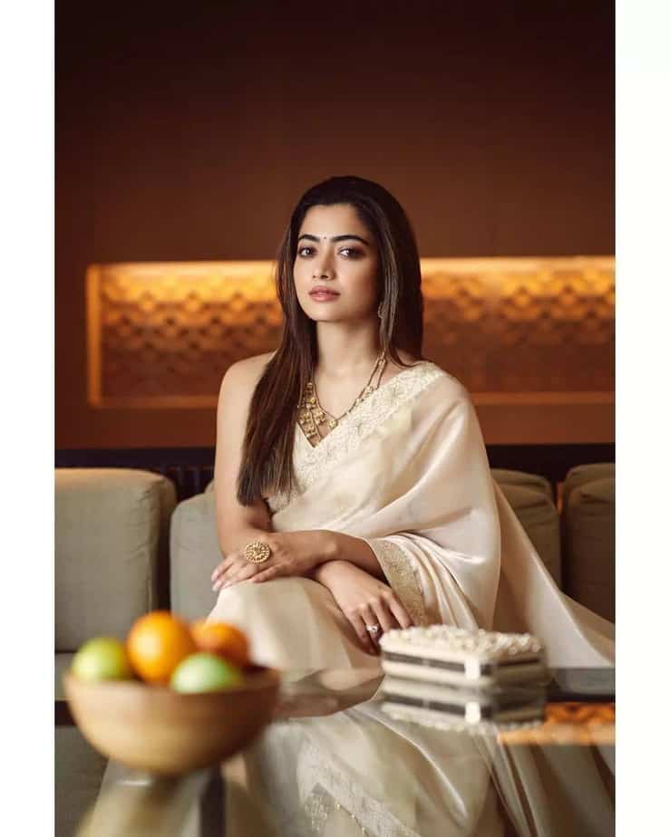 Actress rashmika mandanna hot photos in golden colour saree