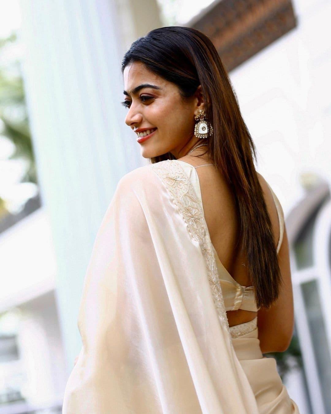 Rashmika mandanna photoshoot in golden colour saree