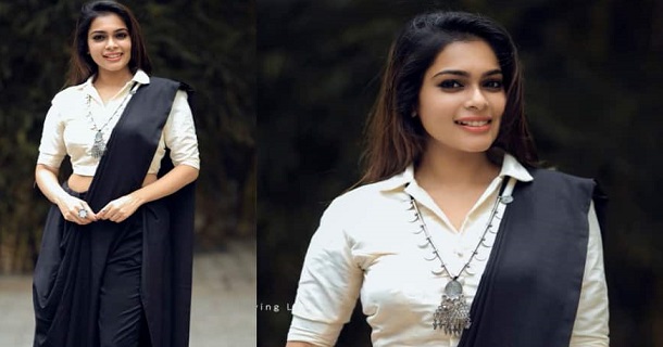 Keerthi vijay photos in shining black dress impressing fans