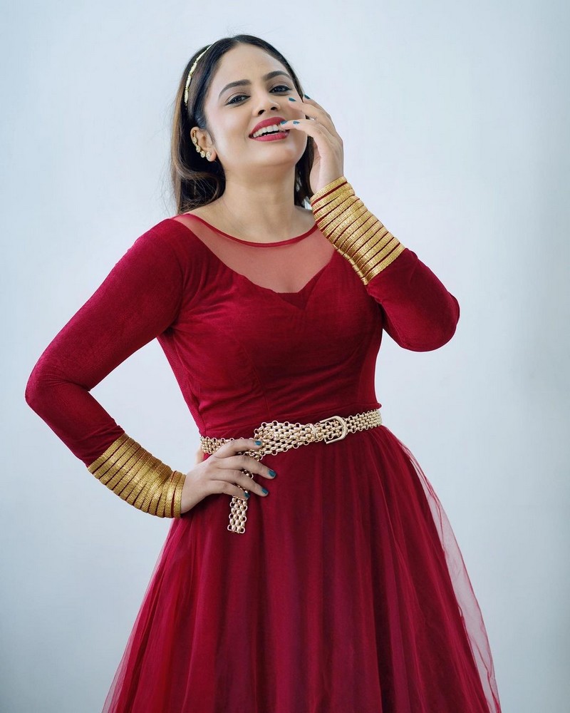 Nandita swetha glamour photos in full red gown
