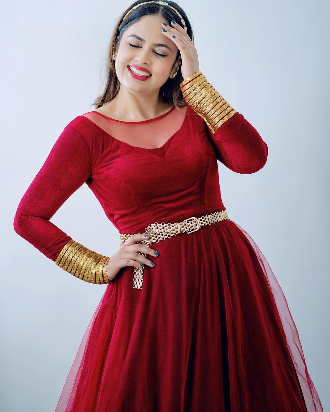 Nandita swetha glamour photos in full red gown