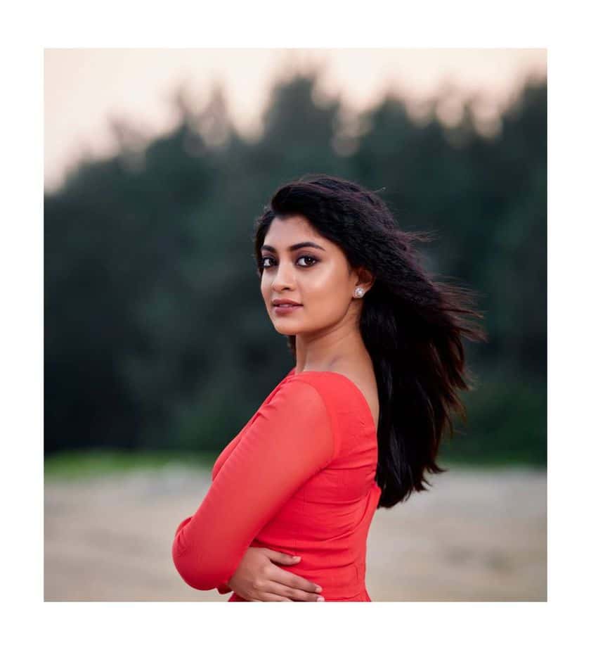 Ammu abirami latest photos in red long gown viral on net