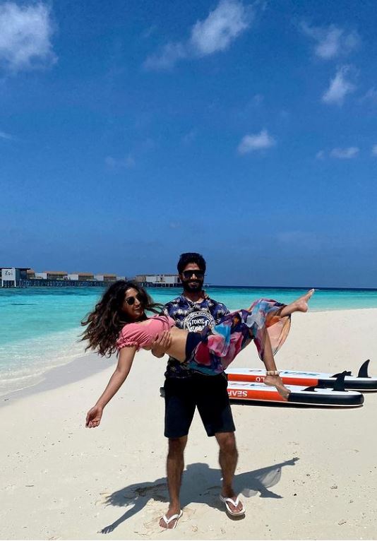 Reba monica john posing hot in two piece dress with her husband