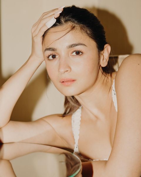 Alia bhatt posing in bathtub showing glamour in short hot dress