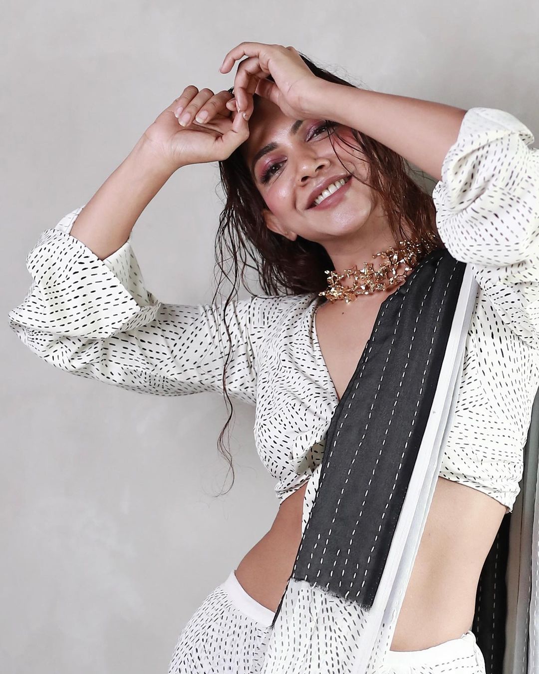 Madona sebastiyan looking glamour in white and black dress with centre open