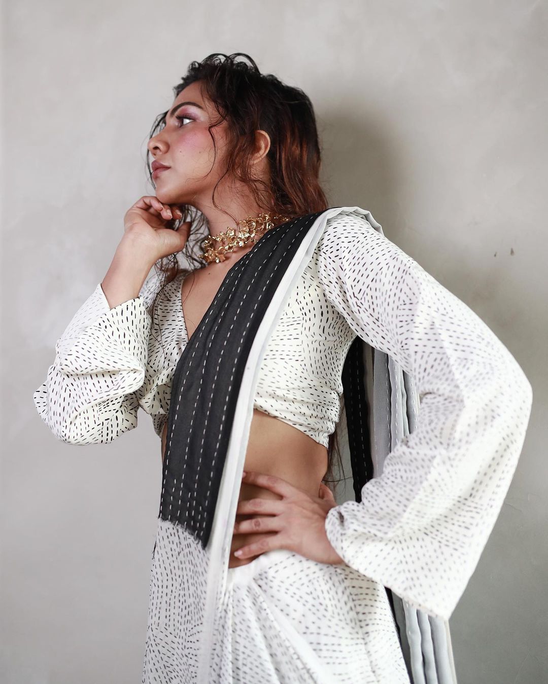 Madona sebastiyan looking glamour in white and black dress with centre open