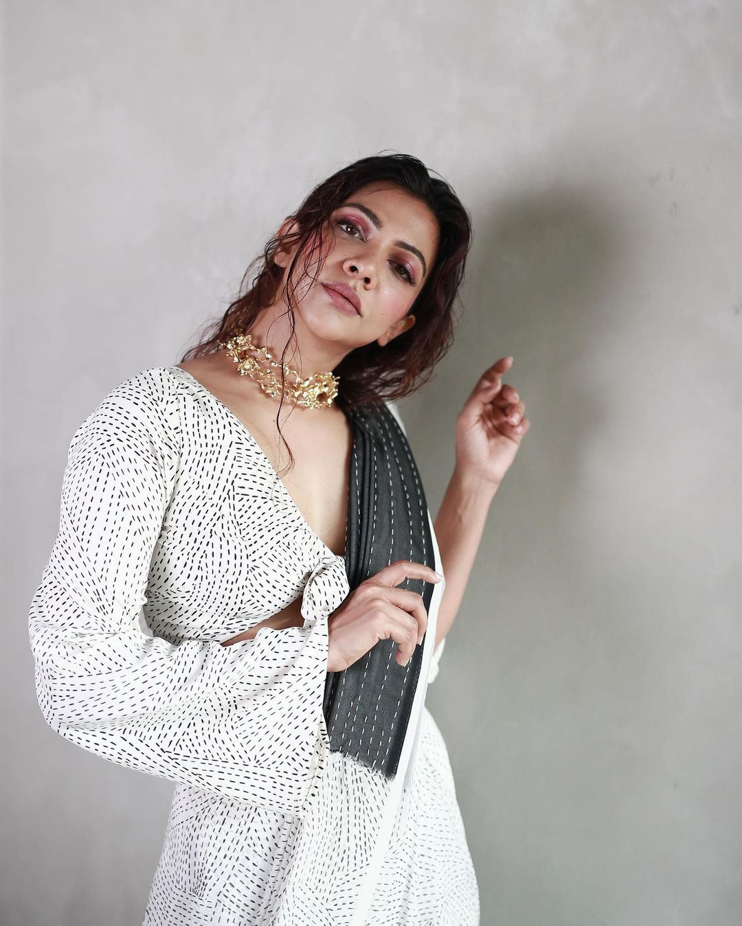 Madona sebastiyan looking glamour in white and black dress with centre open