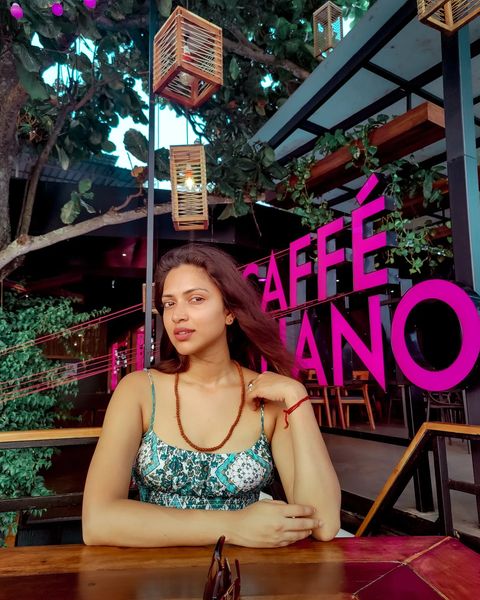 Amala paul hot photos posing in coffee shop near beach