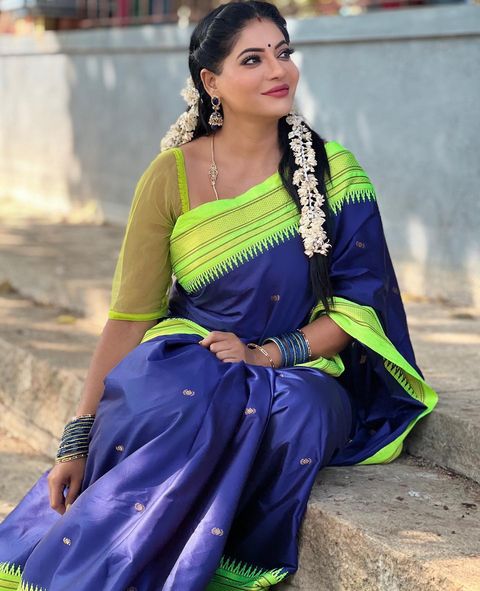 Reshma pasupuleti posing in traditional saree netted blouse photos viral