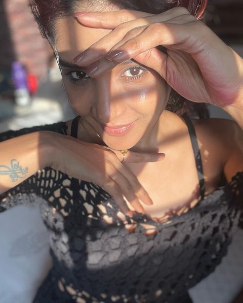 Sakshi agarwal photos in sunlight with black netted over coat dress