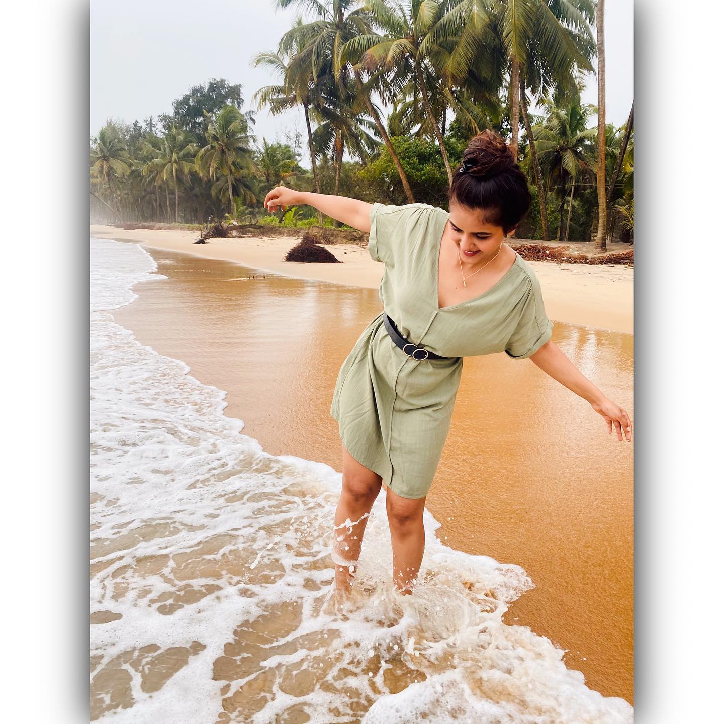 Chaitra reddy playing in sea waves photos getting viral