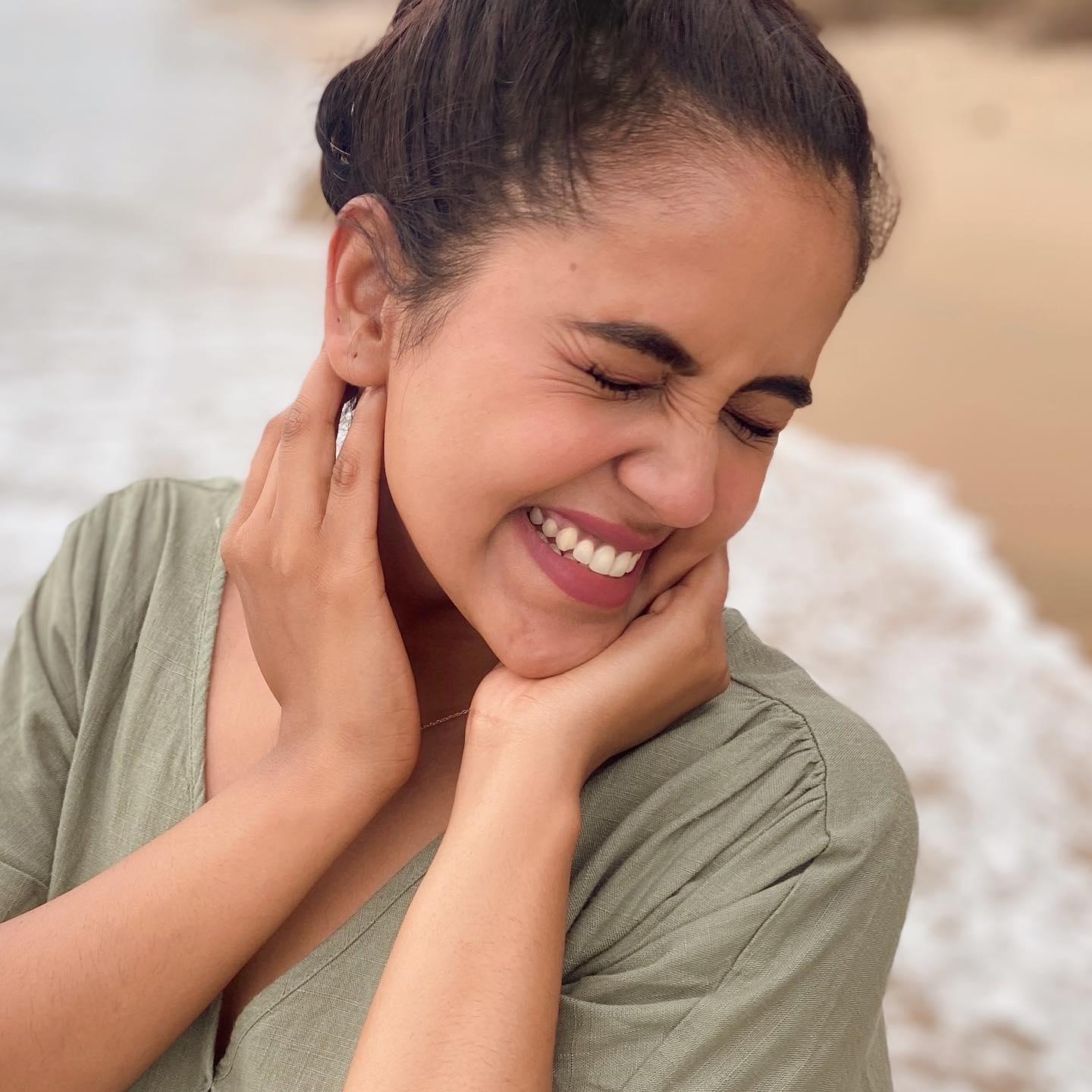 Chaitra reddy playing in sea waves photos getting viral
