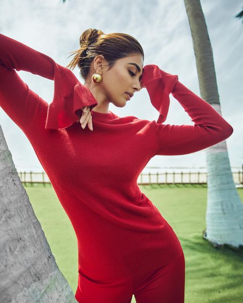 Pooja hegde posing in red hot modern dress photoshoot