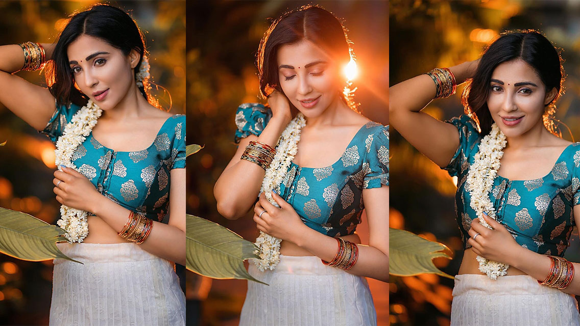 Parvati nair hot photos in white colour saree glamour photoshoot