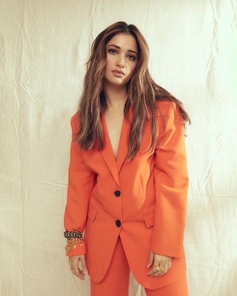 Tamanna bhatia orange suit hot photos impressing fans