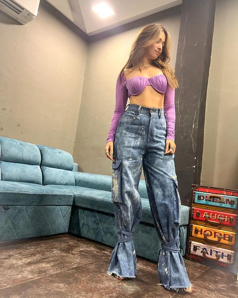 Tamanna rides cycle in hot bikini dress