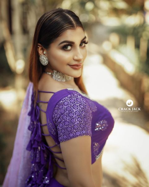 Yashika anandh latest hot purple lehenga photos