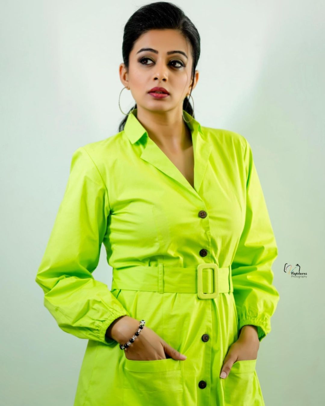 Priyamani hot single shirt green photos trending on internet