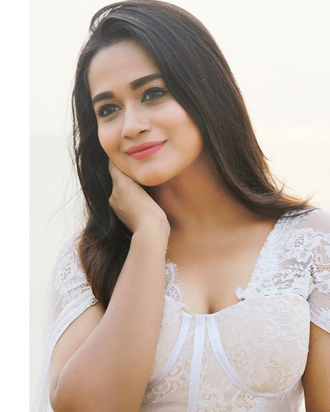 Kavya arivumani hot posing in bridal white dress cute photos