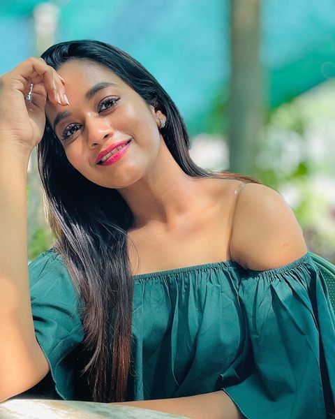 Kavya arivumani hot posing in bridal white dress cute photos