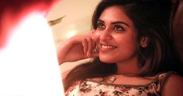 Indhuja ravichandran posing in black colour transparent saree getting viral