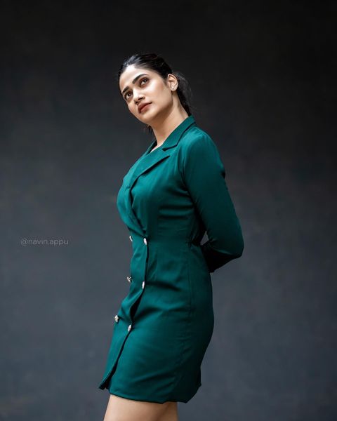 Losliya hot photos in single green shirt photoshoot trending