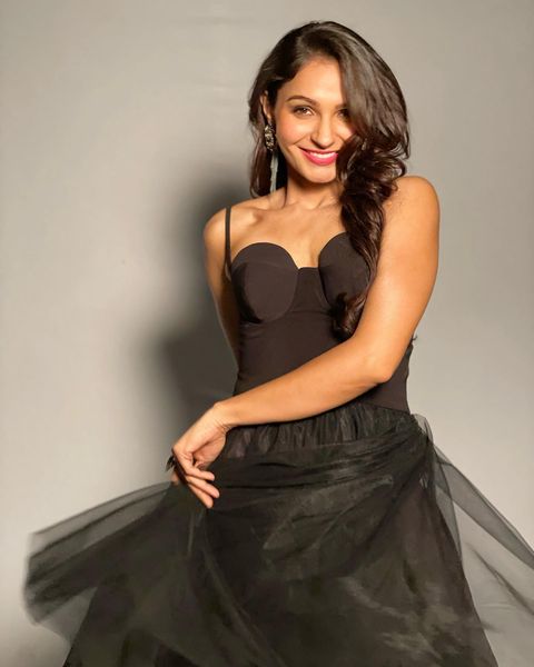 Andrea jermiah hot posing in black short gown photos getting viral