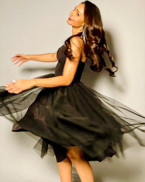 Andrea jermiah hot posing in black short gown photos getting viral