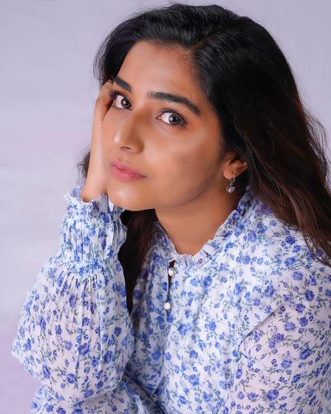 Rajisha vijayan hot pose in short white gown viral photos
